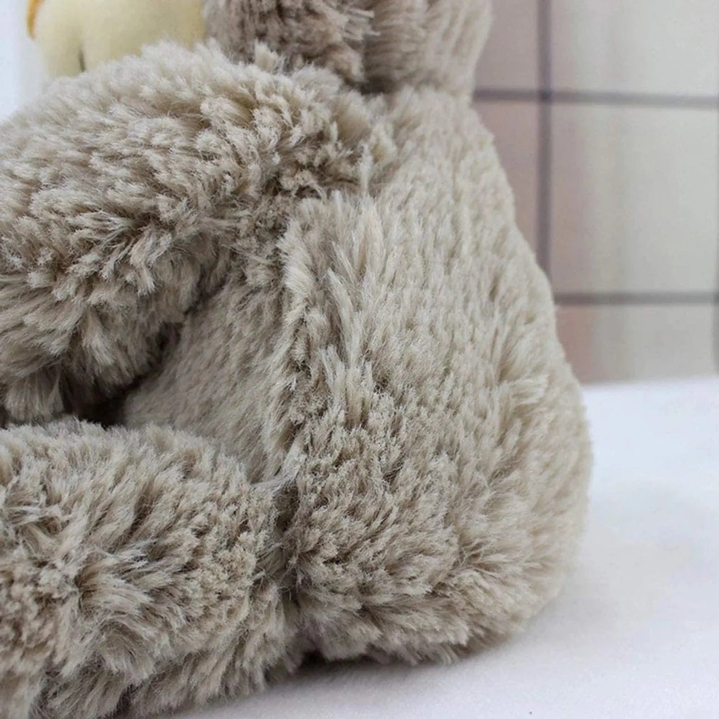 Peluche de paresseux suspendu