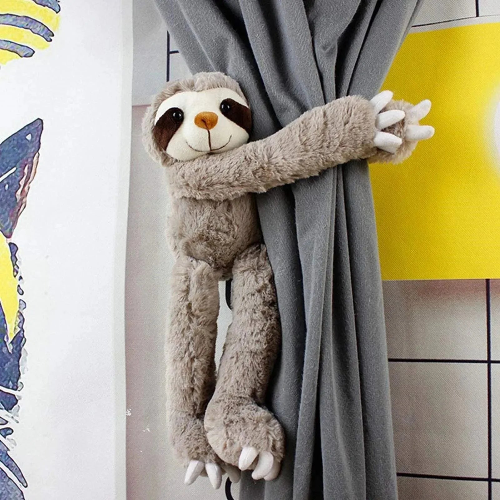 Peluche de paresseux suspendu